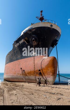 Ship being broken up at Gadani ship-breaking yard, located across a 10 km long beachfront, Balochistan, Pakistan. Stock Photo