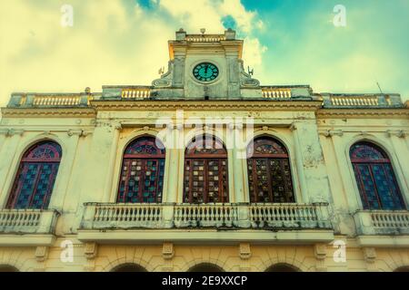 Colonial style building belonging to the CMHW radio station. It is located in the Leoncio Vidal Park in Santa Clara, Cuba. This area is a National Mon Stock Photo