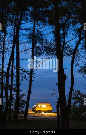 Vintage yellow camper van parked on Grimsel Pass in the Alps Mountains ...