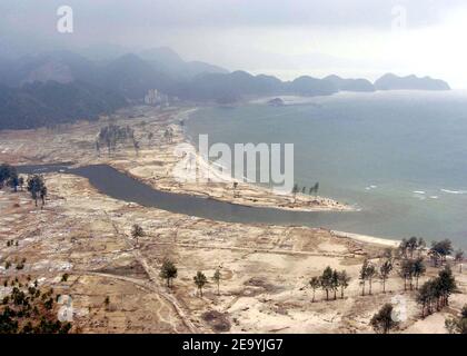An aerial view of the Tsunami- stricken coastal region near Aceh, Sumatra, Indonesia. Helicopters and aircraft assigned to Carrier Air Wing Two (CVW-2) and Sailors from Lincoln are conducting humanitarian operations in the wake of the Tsunami that struck South East Asia. Photo by Tyler J. Clements/USN via ABACA Stock Photo