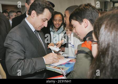Nicolas Sarkozy, as President of the Hauts-de-Seine General Council, meets teachers and students of the 4th College in Asnieres, near Paris, France, on January 17, 2005, as part of his decision to visit every week one city of his department. Photo by Mousse/ABACA. Stock Photo