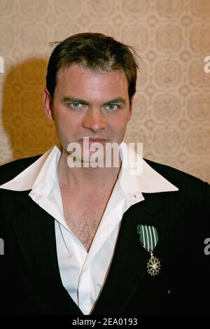 French actor Clovis Cornillac poses after he has been awarded with the Order of Chevalier des Arts et des Lettres during a ceremony at Theatre Dejazet in Paris, France, on February 8, 2005. Photo by Laurent Zabulon/ABACA. Stock Photo