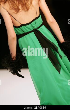 A model displays a creation by Australian fashion designer Collette Dinnigan for her Fall-Winter 2005-2006 ready-to-wear collection presentation in Paris, France, on March 6, 2005. Photo by Klein-Hounsfield/ABACA. Stock Photo