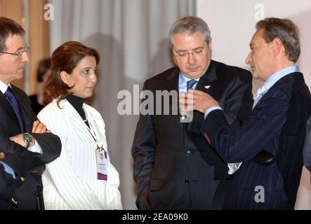 (L-R) International Olympic Committee inspection panel chairwoman Nawal El Moutawakel, of Morocco, Jean-Paul Huchon and Bertrand Delanoe at the Grand Hotel in Paris, France on March 11, 2005, as the IOC evaluation commission examines the Paris candidacy for the 2012 Summer Games. Photo by Eric Feferberg/POOL/ABACA. Stock Photo