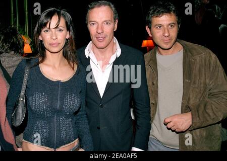 French actress Mathilda May her husband Philippe Kelly (R) and club manager Tony Gomez (C) during the after-party of humorist Elie Semoun's one-man-show 'Elie Semoun se prend pour qui?', at L'Etoile in Paris, France, on March 15, 2005. Photo by Benoit Pinguet/ABACA. Stock Photo
