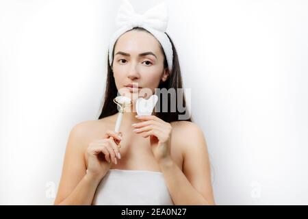 Natural Jade Face Lifting Gouache Scraper Massager  Stock Photo