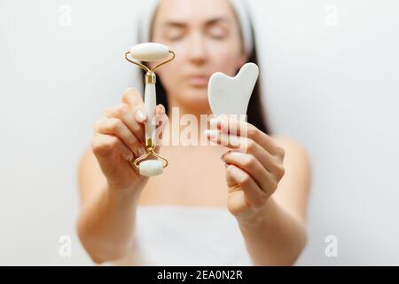 Natural Jade Face Lifting Gouache Scraper Massager  Stock Photo