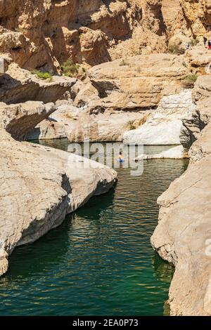 Middle East, Arabian Peninsula, Oman, Al Batinah South, Wadi Bani Khalid. The swimming pools at Wadi Bani Khalid. Stock Photo