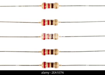 Close up shot of several electronic resistors isolated on white background. Carbon film resistors on white background. Macro shot various electronic c Stock Photo