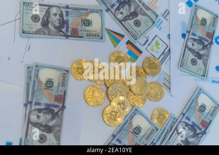 Employees celebrating business success with paper money Stock Photo