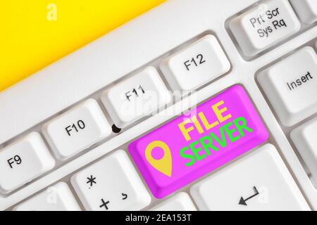 Handwriting text writing File Server. Conceptual photo device which controls access to separately stored data Different colored keyboard key with acce Stock Photo