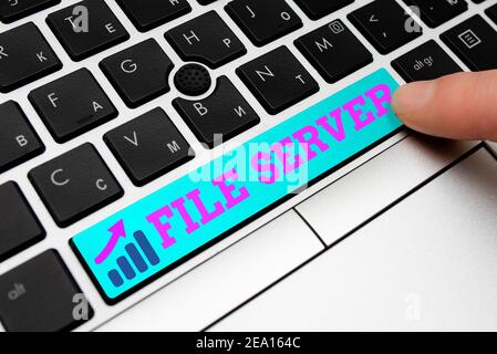 Handwriting text File Server. Conceptual photo device which controls access to separately stored data Different Colored PC keyboard key With Accessori Stock Photo
