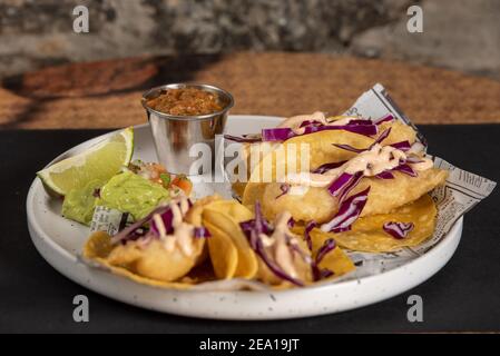 Fresh fish tacos with vegetables. Stock Photo