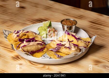 Fresh fish tacos with vegetables. Stock Photo