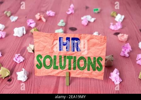 Writing note showing Hr Solutions. Business concept for Outsourced Human resources consultancy and support Experts Colored crumpled rectangle shaped r Stock Photo