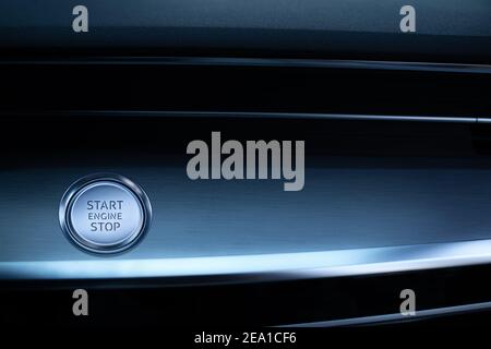Engine start stop button. Car driver starting the engine. Stock Photo