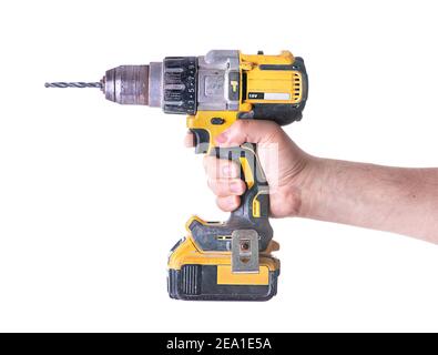 Yellow cordless battery powered drill isolated on white background. Stock Photo