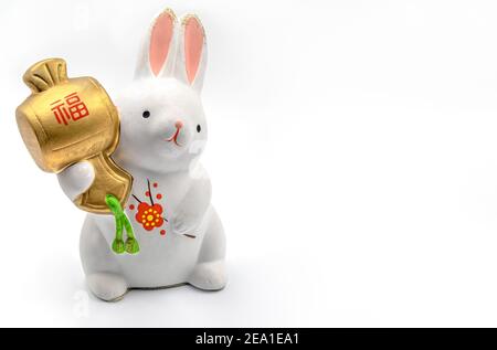 Japanese Zodiac Year of the Rabbit Figurine on White Background Stock Photo