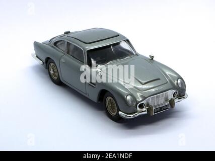 Photo of a Silver die cast model of the Aston Martin DB5 famously used in the Sean Connery James Bond 007 movie Goldfinger in 1964 Stock Photo