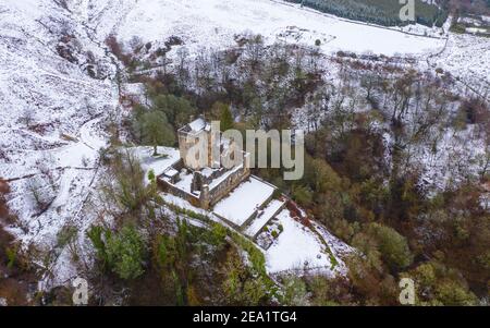 Aerial view of Castle Campbell in the snow, Dollar, Clackmannanshire, Scotland. UK Stock Photo