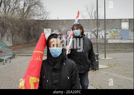 Milan, February 2021, the Brigata Sanitaria Soccorso Rosso (Red Aid Sanitary Brigade), a non-profit organization created by several basic voluntary associations and with the contribution of the independent trade union ADL Cobas, participates in the campaign 'tampon suspended', for the free execution of rapid swabs for the diagnosis of Covid 19 in the critical and extreme suburbs of the city. Stock Photo