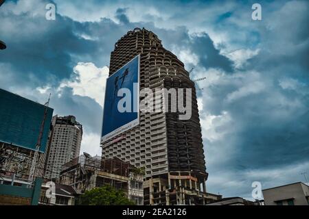 Bangkok, Thailand 08.20.2019 Sathorn Unique Tower, Ghost Tower is an unfinished skyscraper in the Thai capital city Bangkok. Planned as a high-rise co Stock Photo