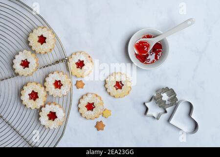 Spitzbube, cookies and bowl with redcurrant jelly, Germany Stock Photo