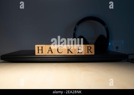 Hacker word on block concept. Close up. Stock Photo