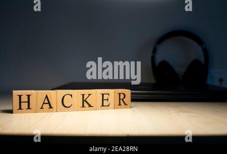 Hacker word on block concept. Close up. Stock Photo