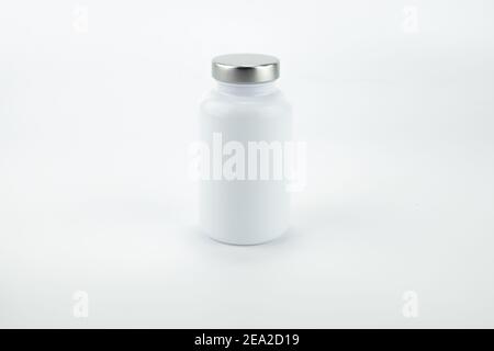 Pills bottle isolated on white background. Stock Photo