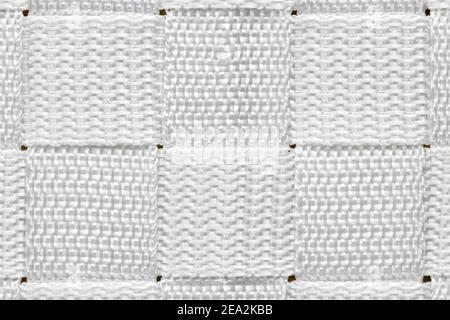 Abstract alternating horizontal and vertical pattern made up of squares of woven white nylon. Stock Photo