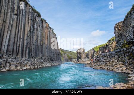 Jokuldalur Iceland - August 6. 2020: Tourists enjoying Studlagil canyon and Jokulsa river Stock Photo