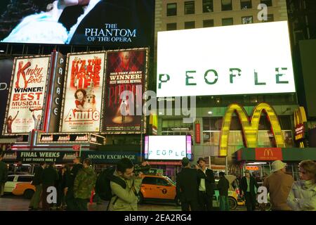 Broadway in NYC . Night street broadway in New York city . People are before Macdonalds and   theater on backgound ads. NEW YORK, USA - SEPTEMBER 20, Stock Photo