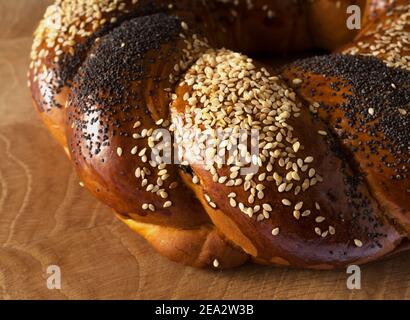 Sweet Slavic bun made in the shape of a ring and called Kalach Stock Photo