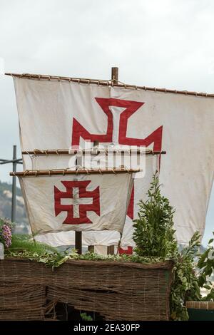 Cross of the Order of Christ on the sails of ships during the Madeira Wine Festival in Funchal. Portugal Stock Photo