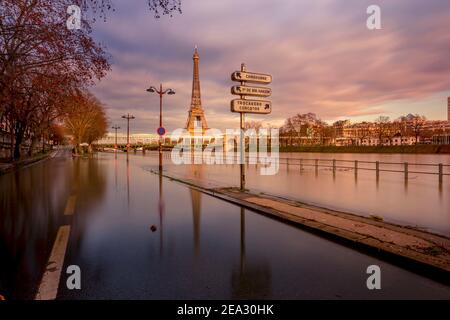 Paris, France - February 4, 2021: View of Paris flood as river Seine rises and approaches record level. Eiffel tower in background Stock Photo