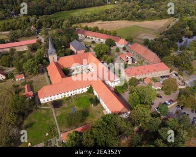 Aerial view of Kloster Wöltingerode, monastery in Goslar, Harz, Lower Saxony, Germany. Medieval convent, today a hotel gastronomy with distillery. Stock Photo