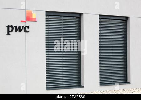 Bourg, France - September 26, 2020: PWC office building. PricewaterhouseCoopers is a multinational professional services network. Stock Photo