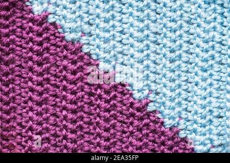 Handmade close-up simple lilac and blue crochet pattern Stock Photo
