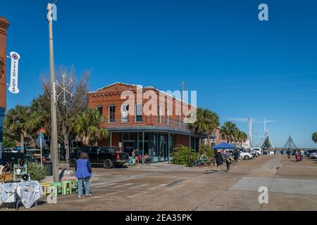 View of main street in the southern US town of Appalachicola, Florida with a local farmer's market. Stock Photo