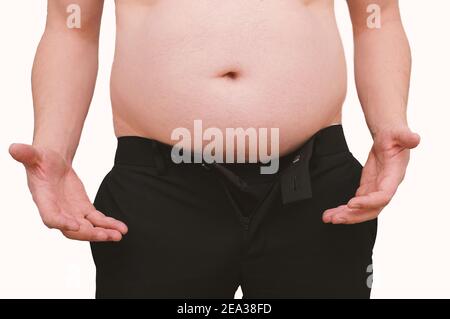 Overweight man with large belly holding out hands in frustration. Stock Photo