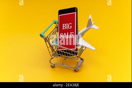 Shopping cart with plane toy. Air tickets sale concept. Stock Photo