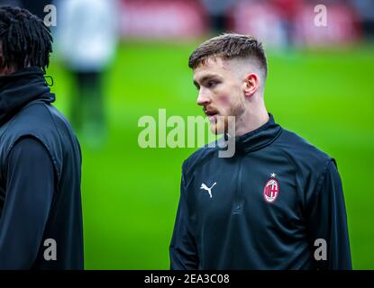 Milan, Italy. 7th Feb, 2021. Milan, Italy, Giuseppe Meazza stadium, February 07, 2021, Alexis Saelemaekers of AC Milan warms up during AC Milan vs Crotone FC - Italian football Serie A match Credit: Fabrizio Carabelli/LPS/ZUMA Wire/Alamy Live News Stock Photo