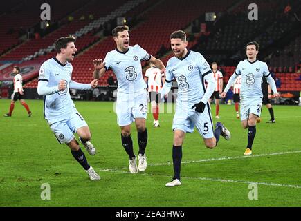Chelsea's Jorginho (centre) celebrates scoring their side's second goal of the game from the penalty spot with team-mates during the Premier League match at Bramall Lane, Sheffield. Picture date: Sunday February 7, 2021. Stock Photo