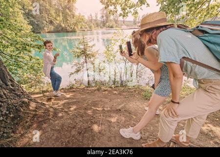 group of smiling friends taking funny selfie with smart phone 34711373  Stock Photo at Vecteezy