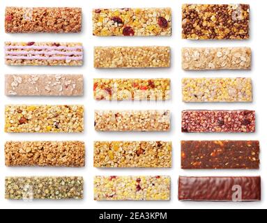 Top view of various healthy granola bars (muesli or cereal bar). Set of protein bar isolated on white background Stock Photo