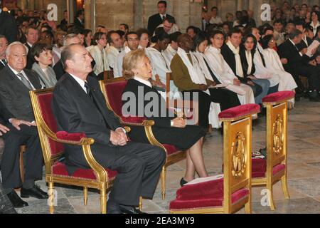 French President Jacques Chirac and his wife Bernadette, Prime Minister Jean-Pierre Raffarin and members of the government attend a special mass celebrated for Pope John Paul II by Monsignor Andre Vingt-Trois, Archbishop of Paris, at Notre-Dame cathedral in Paris, France, on April 3, 2005. Photo by Mousse/ABACA. Stock Photo