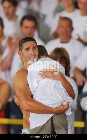 Last official competition of the french swimmer Franck Esposito (200 m butterfly men) with his son Louca during the French swimming championships, in Nancy, on April 13, 2005. Photo by Nicolas Gouhier/Cameleon/ABACA. Stock Photo