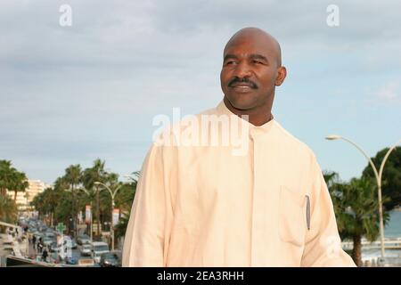 Legendary American boxer 'four times Heavyweight World Champion' Evander Holyfield poses at the Hilton Hotel during the MIPTV 2005 in Cannes, France on April 13, 2005 to promote his autobiographic documentary TV, 'The Real Deal'. Photo by Gerald Holubowicz/ABACA. Stock Photo