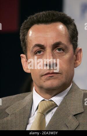 Governing UMP party president Nicolas Sarkozy attends a meeting of UMP ...
